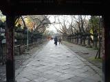 The path after the second gate, lined with brass lanterns